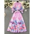 Gentle temperament, vacation style, women's high-end stand up collar lantern long sleeved shirt, high waisted large hem printed skirt