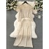 Vacation style early spring dressing set 2024 new knitted cardigan design with hollow out half skirt retro two-piece set