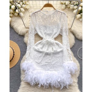 Small dress, high-end dress, luxurious and luxurious, with a sense of luxury. Perspective lace long sleeved feather short style buttocks wrapped dress for women