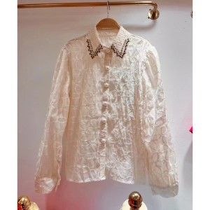 European and American style high-end shirt for women with hollowed out mesh and diamond studded bubble sleeves, designed for a niche and luxurious style top