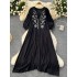 Slightly chubby and slimming dress for women in summer, with a lazy and relaxed style. Loose, flesh blocking, lace up, round neck, lantern sleeves, embroidered over the knee long skirt