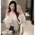 2024 vacation style hanging neck pleated ruffled long sleeved shirt for women's summer new high-end temperament off the shoulder top