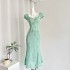 Click to receive a 20 yuan coupon for a light Su mint tea break, French bubble sleeves, hollowed out first love fish tail dress