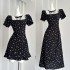 Yang Xiaojuan French retro lace patchwork black floral dress Miu series waist cinched A-line small black dress with a girlish feel