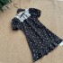 Yang Xiaojuan French retro lace patchwork black floral dress Miu series waist cinched A-line small black dress with a girlish feel