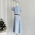 A small wild berry French style design blue shirt dress for women in summer, with a slimming waist and short sleeved long skirt, exuding a slimming temperament