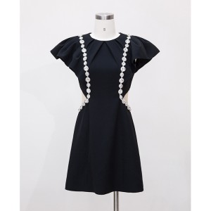 Autumn new black temperament pearl dress with ruffled edges and hollow waist, small black skirt 66992