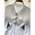 High end long sleeved shirt with a luxurious and sophisticated style, featuring a women's summer collar, pleated waist, slimming design, and a unique and elegant top