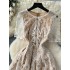 French high-end exquisite dress for women, embroidered flower round neck, bubble sleeves, lace waist cinching, slimming effect, big swing skirt