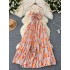 Pure desire sexy vacation dress for women in summer, hollowed out neck hanging suspender, high waist slimming printed pleated long skirt