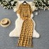 Ladies' high-end knitted suit with polka dot round neck short sleeved top and mid to long slit sweater skirt