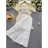 Fairy vacation set 2024 new sexy backless lace up hanging neck vest high waist big swing skirt two-piece set