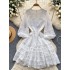 Long sleeved dress for women 2024 new French style design, niche V-neck lace single breasted fluffy short skirt