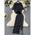 Ladies' high-end knitted suit with polka dot round neck short sleeved top and mid to long slit sweater skirt