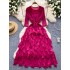 European and American style women's dress with high-end temperament and design sense. Lotus leaf edge splicing, round neck, pressed pleats, and hanging feeling. Long skirt