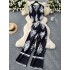 European and American vacation set with women's design sense, tie up waist, V-neck, sleeveless printed top, high waist, casual wide leg pants