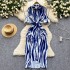 Light luxury French high-end striped printed Polo collar dress for women in summer with a waist cinching design and unique long skirt