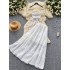 Fairy vacation set 2024 new sexy backless lace up hanging neck vest high waist big swing skirt two-piece set