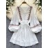 Bohemian vacation dress for female niche retro heavy embroidery V-neck lantern sleeves loose waist A-line short skirt