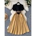 French retro court style round neck bubble sleeve dress with women's design sense, contrasting color splicing, pressed pleats, large swing long skirt