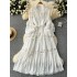 French retro palace style dress 2024 new heavy industry hollow lace splicing waist cinching long skirt