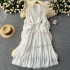 French retro palace style dress 2024 new heavy industry hollow lace splicing waist cinching long skirt