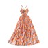 Pure desire sexy vacation dress for women in summer, hollowed out neck hanging suspender, high waist slimming printed pleated long skirt