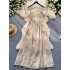 Beach vacation dress for women 2024 new gentle style, loose and slimming A-line floral backless camisole skirt