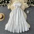 Fairy vacation dress 2024 new gentle style hollow out single breasted sleeveless strapless waist cinching white first love dress