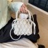 Fairy pearl woven bag spring/summer new 2024 forest style fashionable hollow out personalized hand-held crossbody beach bag trend