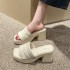 Sponge cake thick soled sandals for women's outdoor wear 2023 summer new fashion niche women's shoes design sense beach one line drag