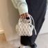 Fairy pearl woven bag spring/summer new 2024 forest style fashionable hollow out personalized hand-held crossbody beach bag trend