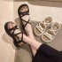 Thick soled sponge sandals for women in the summer of 2024, new Korean version, small cross thin strap, high-heeled Roman shoes