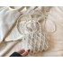 Fairy pearl woven bag spring/summer new 2024 forest style fashionable hollow out personalized hand-held crossbody beach bag trend