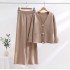 Design sense, contrasting cuffs, large gold button sweater, women's 2023 autumn and winter new item, socialite slimming knit two-piece set