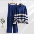 European and American commuting striped high neck two-piece set, autumn and winter loose foreign trade temperament knitted set, sweater, wide leg pants