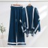 Cross border leisure suit women's autumn and winter new style temperament lazy style knitted sweater shawl cape wide leg pants three piece set