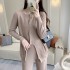 2022 autumn and winter Southeast Asian knitted two-piece set with niche design, irregular slit top for slimming, foreign trade to Thailand