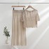 Hollow hook flower short sleeved knitted sweater top+high waist slimming mid length ruffled skirt two-piece set for women