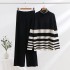 European and American commuting striped high neck two-piece set, autumn and winter loose foreign trade temperament knitted set, sweater, wide leg pants