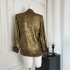 Good morning, Fan Fan. Distinctive gold cracked shirt with chain design on cuffs, niche loose long sleeved top for women, Xia