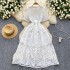 High end Western style dress for women, French retro heavy industry hollow lace round neck short sleeved waist cinched mid length dress