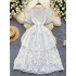 High end Western style dress for women, French retro heavy industry hollow lace round neck short sleeved waist cinched mid length dress