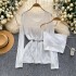 Korean style age reducing two-piece set for women, lazy and versatile, long sleeved hollow hook flower knitted hooded sweater with suspender vest inside