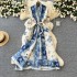 European and American style large edition dress for women, fashionable and stylish, versatile with a lapel and waist cinching strap, medium to long pleated printed jacket