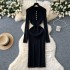 French retro lapel single breasted long sleeved knitted dress for women with a cinched waist to show off a slimming temperament, paired with a woolen dress and a long skirt