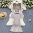 Long sleeved dress for female autumn and winter socialite, slim fit and slimming, round neck knitted skirt, elastic and tight fit, long over the knee woolen dress