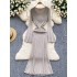 Long sleeved dress for female autumn and winter socialite, slim fit and slimming, round neck knitted skirt, elastic and tight fit, long over the knee woolen dress