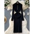 French retro lapel single breasted long sleeved knitted dress for women with a cinched waist to show off a slimming temperament, paired with a woolen dress and a long skirt