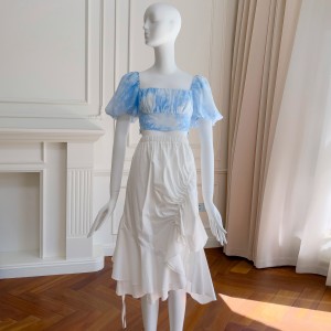 Summer new style with a fresh blue bubble sleeve top paired with a mid length pleated irregular knee length skirt